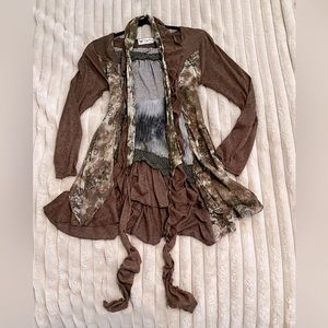 Unique boho top that looks great with jeans or leggings!!